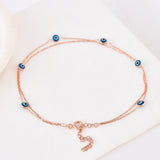 Layered evil eye anklet