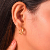 Evelyn twisted hoops