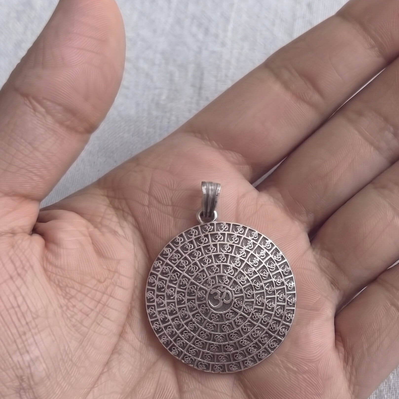 Om silver pendant