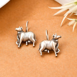 Dhenu silver earrings