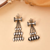 Damru long silver earrings